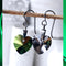 Scarabaeus Green Crystal Titanium Drop Earrings